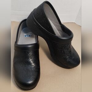 Dansko LT Clogs With Black Floral Embossed Design